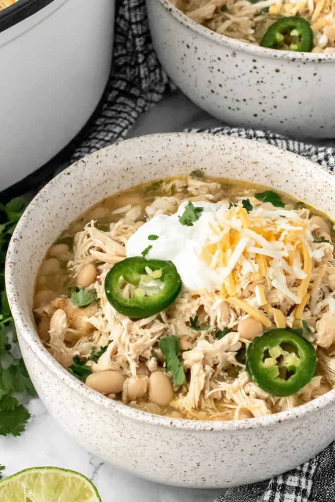 The Easiest Crockpot White Chicken Chili with Cream Cheese (Kid-Friendly Fall Dinner Recipe!)